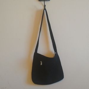 The Sak black shoulder bag. Beautiful, perfect condition. Never used. NWOT